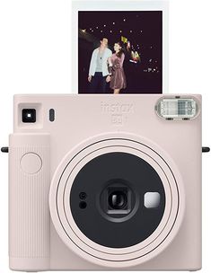 an instax camera with a polaroid print on the front and back side