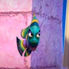 an animated fish is hanging from the side of a purple wall with a yellow stripe