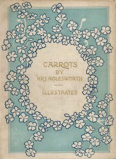 an old book with white flowers on blue paper and gold lettering that reads carrots by mrs mollesworth illustrated