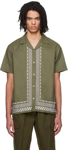 Plain-woven cotton shirt. · Open spread collar · Button closure · Graphic and check patterns embroidered at front · Logo flag at side seam · Vented side seams · Logo patch at back hem Supplier color: Olive green Embroidered Green Cotton Shirt, Green Embroidered Cotton Shirt, Green Embroidered Collared Shirt, Green Embroidered Button-up Shirt, Check Pattern, Embroidered Shirt, Cotton Weaving, Olive Green, Patch Logo