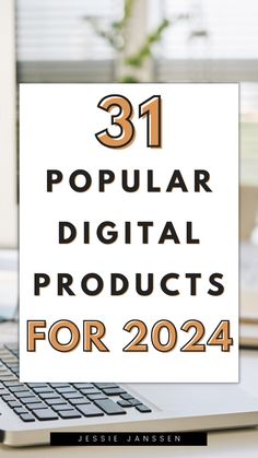 a white sign that says 31 popular digital products for 2014 on top of a laptop