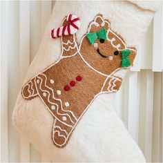 a christmas stocking hanging from the side of a radiator