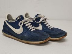 1983 NIKE Nylon Sneakers Navy x White Men's US 9 1/2 9.5 Very early Nikes Made in Republic of KOREA Uppers are in good overall condition Soles show chipping on toes and heels Insoles show significant wear Laces may be original ....unknown Sold as a collectible for display because of age These vintage Nikes are nearly 40 years old and will only increase in value over time Vintage Nike Blue Sneakers, Vintage Blue Nike Sneakers, Nike Vintage Sports Sneakers, Vintage Nike Sports Sneakers, Vintage Nike Sneakers For Sports, Vintage Running Sneakers, Nike Vintage Sneakers, Vintage Sneakers, Vintage Nike