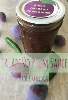 a jar of jalapeno plum sauce on a table