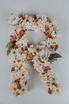 the letter r is made up of flowers