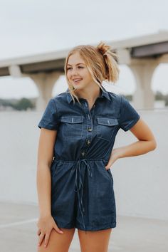 Short sleeve button detail denim chambray romper.Brooklin is wearing a size smallLightweight chambray denimAdjustable waist drawstring & button down topThis item is final sale. Dark Wash Denim Jumpsuit For Day Out, Short Sleeve Cotton Denim Jumpsuit For Day Out, Denim Blue Cotton Button-up Jumpsuits And Rompers, Cotton Short Sleeve Denim Jumpsuit For Day Out, Cotton Denim Jumpsuit With Short Sleeves For Day Out, Casual Dark Wash Short Sleeve Jumpsuits And Rompers, Casual Denim Jumpsuit With Buttons, Medium Wash Short Sleeve Jumpsuits And Rompers With Buttons, Button-up Denim Jumpsuit For Day Out