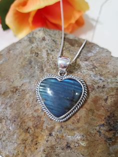 * Labradorite heart Pendant  *Sterling Silver  *Free Shipping  *Handcrafted  *Jewelry ship in Gift box * Ready to ship  *Color Stone may look different  All components are solid .925 silver.  Thank You For Your Looking ,And Check Out More Items In My Etsy Shop For More Great Deals, Also We Add More Jewelry To Etsy Shop regularly  PLEASE check their dimensions, before setting the order.  NOTE -Once the parcel gets shipped out, it is usually needed 3-6 business days for every where in US Please ke Artisan Heart-shaped Gemstone Necklace, Pendant Heart, Large Heart, Valentines Necklace, Color Stone, Labradorite Pendant, Valentines Gift, Blue Heart, Heart Pendant Necklace