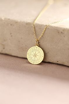 Gold Compass Pendant - Compass Gold Necklace ● Material of pendant: Solid Gold 14k ( REAL GOLD ) ● Metal Stamp: 14k ( REAL GOLD ) ● The pendant is available in 5 sizes: - 12,7 mm / 0.5 inches (Diameter) - 14,0 mm / 0,55 inches ( Diameter ) In the photos - 15,3 mm / 0.6 inches ( Diameter ) - 16,5 mm / 0,65 inches ( Diameter ) - 19,1 mm / 0,75 inches ( Diameter ) ( In the photos the size is 14mm / 0.55 inches Diameter ) ( Jump Ring inner diameter: 4 mm ) ● Material of chain: Solid gold 14k ( REAL Engraved Medallion Necklace For Travel, Vintage Gold Necklace With Compass Design, Symbolic Gold Necklaces With Compass Design, Personalized Gold Necklace For Travel, Gold Metal Jewelry With Compass Design, Gold Compass Design Necklace For Travel, Gold Compass Design Necklace In Stainless Steel, Gold Compass Design Pendant Jewelry, Gold Compass Necklace