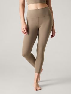 FOR: Yoga or studio practice FEEL: Powervita fabric is buttery soft with support that feels like a gentle hug FAVE: Easy-access stash pockets Fitted next to the body with a high-rise waistband 7/8 length, hits just above ankle Inseam: Regular/Plus: 25" Petite: 23" Tall: 28". Beige Leggings, Petite Size, Easy Access, Tights, High Rise, Yoga, Leggings, Fabric