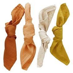 three different colored ties tied to each other on a white background with one knot in the middle