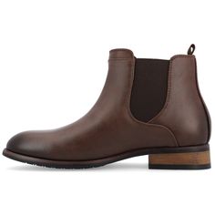 Introducing the Landon, this high-top Chelsea dress boot by Vance Co. features premium faux leather uppers that rise to the ankles with subtle top-stitching bordering the stretchy side panels. The stretch gore panel offers a classic design that you can pull on with ease. Mahogany faux woodgrain block heels and outsoles finish the look. Chelsea Dress, Dress Boot, Brown Chelsea Boots, Closed Toe Shoes, Timberland Mens, Round Toe Heels, Chelsea Boot, Waterproof Boots, Side Panels