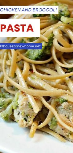 pasta with chicken and broccoli on a white plate