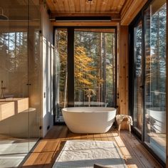 a large white bath tub sitting inside of a bathroom