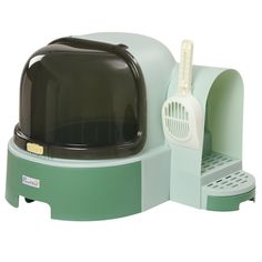 a green toaster oven sitting on top of a counter