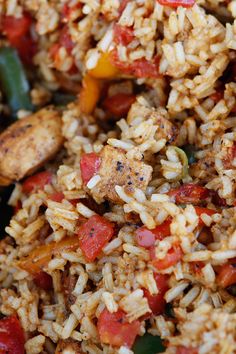 rice and vegetables are mixed together in a bowl