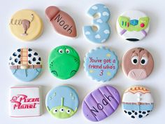 decorated cookies are arranged in the shape of numbers for children's birthdays and special occasiones