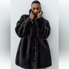 Faux Fur Coat - Only Two Sizes Comes Larger Than Usual . The Sizes Mentioned Below Are Sizes That Can Fit The Extra Small And Medium . Coat With Lapel Collar And Long Sleeves. Side Hidden In-Seam Pockets. Matching Interior Lining. Front Fabric-Lined Metal Hook Closure. Mid-Gray | 1255/894 Zara Winter Coat, Zara Faux Fur Coat, Long Black Vest, Puffer Vest With Hood, Sleeveless Trench Coat, Zara Denim Jacket, Green Denim Jacket, Light Wash Jean Jacket, Zara Leather Jacket