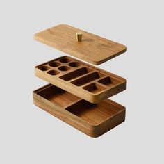 two wooden trays with compartments on each side