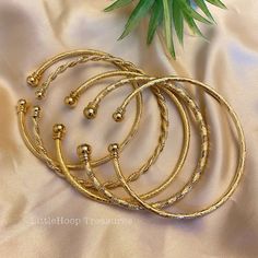 "18k women Gold adjustable Bangles gift for Women | Dubai Gold Bangles for Women | bangle | gold bracelet | adjustable bangle | gift for her | bangle set. Size: inner diameter 2.8\", Lenght 7\" adjustable fit for any wrist size. available 5 style/pattern 💖Price for one bangle buy more to make them glamour look. 18k Gold Plated High quality Not Tarnish and hypoallergenic you will love them! perfect for party or hangout with friends. 🦋Jewelry Care: As with all pieces that are not real gold, it i Elegant Resizable Cuff Bracelet As Gift, Adjustable Gold Plated Bangle Bracelet, Adjustable Gold-plated Bangle Bracelet, Resizable Gold-plated Bracelets, Elegant Gold Resizable Cuff Bracelet, Elegant Resizable Gold Cuff Bracelet, Handmade Gold Plated Bangle As A Gift, Gold Resizable Cuff Bracelet Gift, Adjustable Resizable Gold Bangle