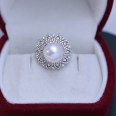 Get dressed up with our 10-11mm Freshwater Pearl & Round Cubic Zirconia. It has the perfect combination of elegance and style. The freshwater pearl creates a timeless look that makes this piece an ideal choice for any outfit. The round cut Cubic Zirconia add just the right amount of sparkle and shine to the overall design. This ring is perfect for special occasions or everyday wear, so you can show off your glamourous side no matter where you go. 10-11mm Freshwater Pearl Earrings This popular ea Pearl Jewelry Ring, Popular Earrings, Pearl Rings, Freshwater Pearl Earrings, Purple Pearl, Freshwater Pearls Earrings, Pearl Types, Cz Ring, Rings Jewelry