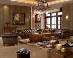 a living room filled with furniture and a chandelier