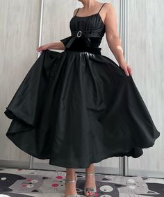 Stunning 50's style vintage timeless evening dress, by Höpfner Jeunesse. Spaghetti straps, fitted top with beautiful floaty bell-shaped skirt. It is cut in a corset style at the top and becomes wonderfully wide at the bottom.  Size vintage 38, but I would say it would be best for size 36 or small 38. Photo on size 38. The zipper is at the back. Good vintage condition - no visible defects. Evening Dress With Spaghetti Straps And Lined Bodice, Evening Dress With Fitted Bodice And Overbust, Prom Evening Dress With Lined Overbust Bodice, Fitted Bodice Evening Dress With Overbust, Prom Evening Dress With Lined Bodice, Fitted Bodice Overbust Evening Dress, Gala Evening Dress With Full Skirt And Lined Bodice, Full Skirt Evening Dress With Lined Bodice For Gala, Evening Overbust Dress For Prom Season