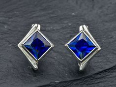 Square Sapphire Earrings set with Created Sapphires in a flawless color & clarity, 8x8mm, 6 Ct. Solid 925 Sterling Silver ☞ made to last. Matching Ring: www.etsy.com/listing/1702807162 Matching Pendant - please ask me   For Pierced Ears - has a pin that goes into the ear and a leaver that securely closes on the pin behind the earlobes - "English Lock"    Details :  ♥ Each item comes in a cute GIFT BOX ✓  ♥ GUARANTEE on the materials ✓ ♥ Created Sapphire in a perfect princess cut & flawless clari Modern Blue Earrings For Anniversary, Modern Sapphire Sterling Silver Earrings, Blue Sapphire Earrings, Matching Ring, Birthstone Earrings, Cute Gift Boxes, Real Jewelry, Birthstone Earring, Matching Rings