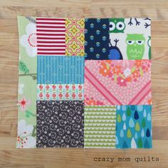 a patchwork quilt with many different patterns on the front and back, along with words that read crazy mom quilts