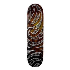 a skateboard with an intricate design on it