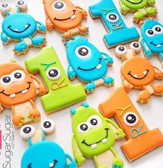 decorated cookies are arranged in the shape of letters and numbers for children's birthdays