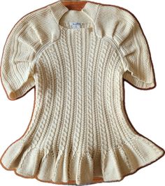 Designer Beige Tops For Spring, Designer Cream Tops For Spring, Cream Fitted Sweater With Ruffles, Fitted Cream Sweater With Ruffles, Elegant White Short Sleeve Sweater, Elegant Short Sleeve Sweater For Spring, Elegant Cream Sweater For Summer, Elegant Short Sleeve Spring Sweater, Elegant Cream Summer Sweater