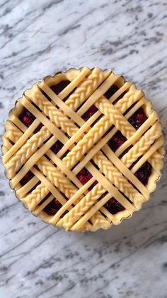 a pie sitting on top of a marble table