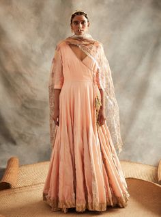 This set features a peach chanderi gherdaar double-layered angarakha with a silver woven zari godet insert with one of the kind hand painted and hand embroidered madhubani organza dupatta embellish... Angrakha Anarkali, Peach Anarkali, Embroidered Anarkali, Anarkali Gown, Organza Dupatta, Lehenga Designs, Indian Fashion Designers, Anarkali Dress, Pernia Pop Up Shop