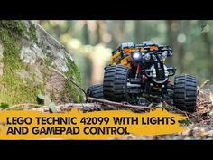 lego technic 4209 with lights and gamepad control on the ground in the woods