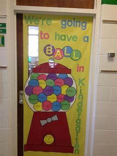 a classroom door decorated with gumball machine and congratulations to the school's teacher