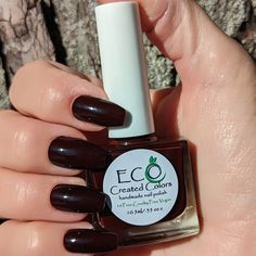 Hi, all lovers of nail polish Eco Created Colors are a custom handmade 10 free, cruelty free, vegan polish 10 FREE IS BETTER FOR YOU AND ME! CHOCOLATE CHERRY - Mysterious deep dark black cherry that's perfect for transitioning into a new season. Looks amazing on fingers and toes. This vegan 10 free formula with a wide brush for application dries quickly and glides on smoothly.  If you want to add a little sparkle or pizazz, remember we have an extensive topper collection you can add over CHOCOLATE CHERRY! To get the best shelf-life store in a cool dark place and keep out of direct sunlight THIS IS VERY IMPORTANT. To achieve the look shown in the photos I applied 3 coats of CHOCOLATE CHERRY and always a quick dry topcoat https://etsy.me/2H7W64j to finish.  Under SECTIONS/ITEMS on EcoCreated Dark Brown Nail Polish, Black Cherry Nail Polish, Cherry Nail Polish, Black Cherry Nails, Cherry Nail, Brown Nail Polish, Brown Nail, Cherry Nails, Brown Nails