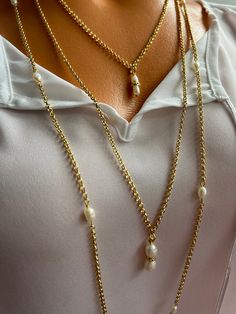 🤗The Pearl Set Necklace is a good option for jewelry lovers, you can wear it in any way you desire . Consists of three different sizes rows, which makes it wearable for any ocasions and even as a daily look. The largest raw is 90 cm long , as a necklace on the neck it is 45 cm and it has closure . This raw can be used in two ways , thirst option is to wear it as a long necklace or you can transform it into a 2 layered choker as the clasp makes it possible to wear . The chai is non allergic gold filled bronze. The middle raw length is 35 cm length and the last raw is 25 cm length and ive added an extra extension chain to adjust the size.  ❗ Feel free to contact me for your different size request . Each item is individually wrapped in craft jewelry gift box. If you want to add a gift note t Gold Long Chain, Long Chain Necklace, Set Necklace, Pearl Set, Long Chain, Jewelry Lover, Jewelry Gift Box, Long Necklace, Jewelry Crafts