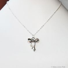 Silver Ribbon Bow Necklace  (D3H3) Bow Necklace Aesthetic, Ribbon Bow Necklace, Silver Bow Necklace For Wedding, Silver Party Jewelry With Satin Bow, Silver Jewelry With Satin Bow For Party, Delicate Silver Jewelry With Bow Detail, Delicate Silver Jewelry With Bow, Silver Sterling Silver Necklace With Bow, Dainty Silver Necklace With Bow