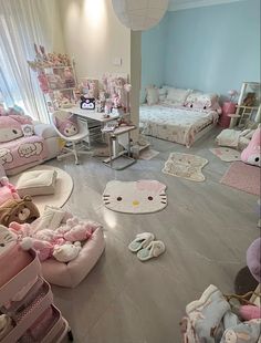 a room filled with lots of stuffed animals on the floor next to beds and desks