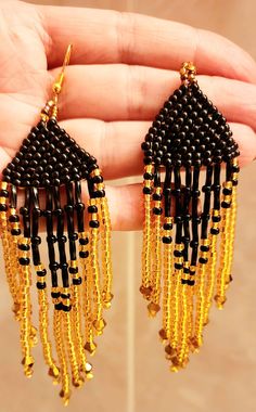 elegant long earring made of high quLity ceed beads. black/gold or mint/teal colors Delica Bracelet, Long Earring, Blue Ice, Lace Doilies, Earrings Blue, Livingston, Teal Colors, Beaded Lace, Long Earrings