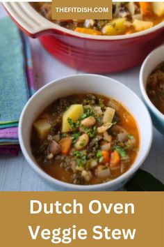 two bowls filled with vegetable stew on top of a table