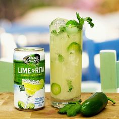 a can of limeade and a cucumber on a table