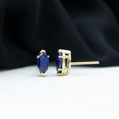 Product Details These Solitaire Stud Earrings featuring Marquise Cut Created Blue Sapphire as Solitaire in a prong setting, crafted in Solid Gold. Product Information SKU SHP-EARRINGS042170978 Length 9 mm Width 4 mm Weight 1.04 gm (Approximate) LAB CREATED BLUE SAPPHIRE INFORMATION No.of Stones 2 Pieces Total Weight 1.50 Carat (Approximate) Dimension(approx) Marquise-4X8 mm-2 Pcs Color Blue Cut Brilliant Shape Marquise Setting Type Prong-Setting Quality Grade AAAA View More Marquise Setting, Sapphire Solitaire, Solitaire Studs, Marquise Cut, Prong Setting, Blue Sapphire, Solid Gold, Sapphire, Color Blue