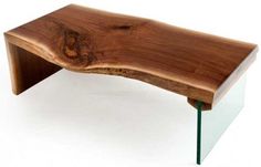 a wooden bench made out of wood with glass sides on the bottom and green legs