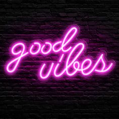 a neon sign that says good vibes