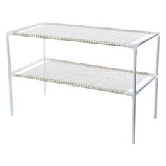 a white shelf with two shelves on each side