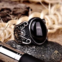 Men's onyx gemstone signet ring which will give you a head turning presence. This mystic, vintage style, engraved ring has a unique design for the polished, refined, and distinguished man. Perfect for casual and formal events, it will make your friends envious as you walk into the room full of confidence and pride. Looking for a unique, one of a kind GIFT FOR HIM, groomsman gift, father's day gift, teacher day gift? Look no further. This cool gemstone ring is the right answer and best gift for a Symbolic Black Stainless Steel Rings, Adjustable Black Symbolic Signet Ring, Black Symbolic Adjustable Rings, Adjustable Black Symbolic Rings, Symbolic Black Gemstone Jewelry, Symbolic Black Oval Jewelry, Black Spiritual Engraved Ring For Anniversary, Symbolic Black Skull Ring, Rings Black Stone