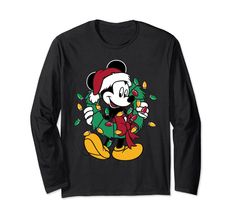 PRICES MAY VARY. Solid colors: 100% Cotton; Heather Grey: 90% Cotton, 10% Polyester; All Other Heathers: 50% Cotton, 50% Polyester Imported Pull On closure Machine Wash Officially Licensed by Disney Disney, Classic, Cartoon, Walt Disney, Disneyland, Mouse, Mickey Mouse, Classic, Comic, Christmas, Holidays, Wreath, Christmas Lights. Graphic Artwork: ODNY-0915 Lightweight, Classic fit, Double-needle sleeve and bottom hem Comic Christmas, Mickey Mouse Classic, Disney Christmas Shirts, Mouse Christmas, Mickey Christmas, Mickey Mouse Christmas, Disney Disney, Wreath Christmas, Graphic Artwork