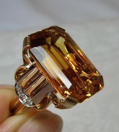 Retro 14 Carat Emerald Cut Citrine Diamond Ring 14 Karat Rose Gold Walton and Co. For Sale at 1stdibs Elegant Emerald-cut Topaz Rings, Elegant Citrine Rings For Formal Occasions, Elegant Citrine Diamond Ring With Accents, Art Deco Radiant Cut Ring For Formal Occasions, Elegant Citrine Rings With Diamond Cut, Elegant Octagon Citrine Rings, Luxury Emerald-cut Topaz Jewelry, Elegant Baguette Cut Citrine Jewelry, Elegant Topaz Rings With Polished Finish