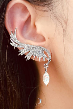 angel wing fashion jewelry Silver Cubic Zirconia Ear Cuff For Party, Silver Crystal Ear Cuff For Party, Party Cubic Zirconia Ear Cuff, Cubic Zirconia Ear Climbers For Party, Party Cubic Zirconia Ear Climbers, Elegant Silver Winged Earrings, Party Ear Cuff Made Of Cubic Zirconia, Elegant Winged Jewelry For Parties, Silver Angel Wings Elegant Earrings